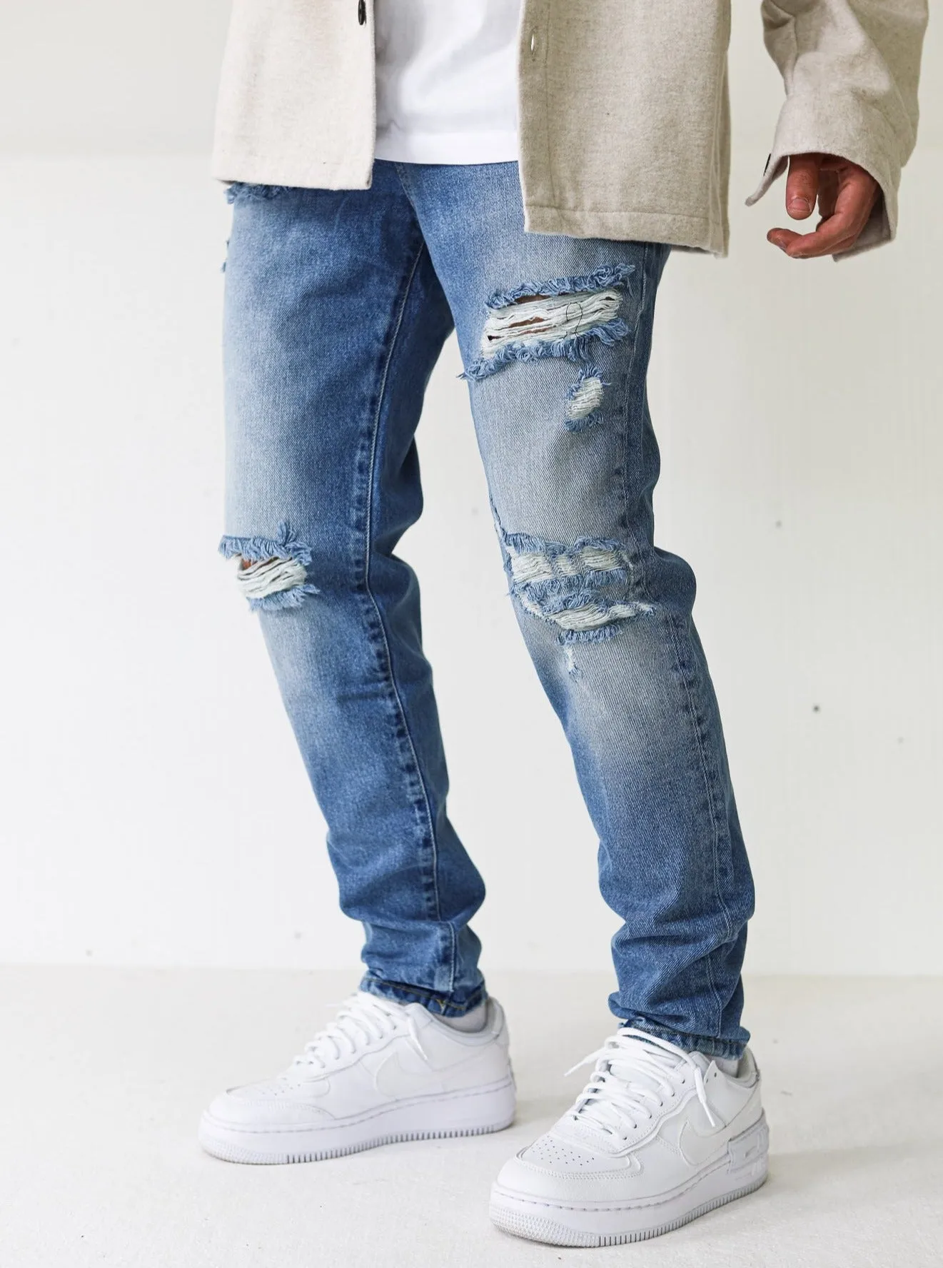 Destroyed Premium Spray On Blue Jeans