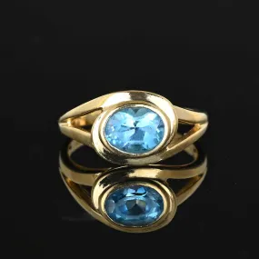 Vintage 14K Gold Blue Topaz Ring, Bypass Style